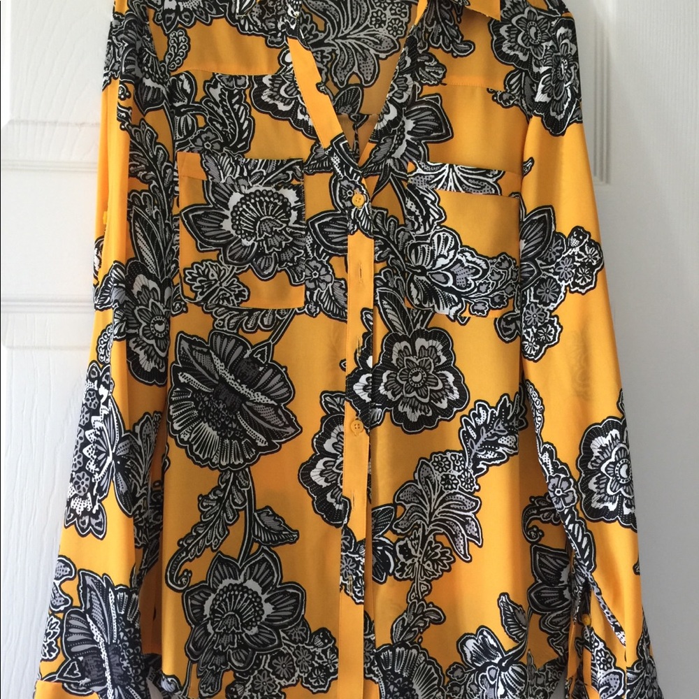 Stand OUT in this rich and vibrant dress Blouse!